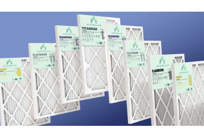 Accumulair air filters arranged in a row against a blue background, showing the product line from MERV 8 Gold and MERV 10 Carbon to MERV 11 Platinum, MERV 13 Diamond, and Titanium.